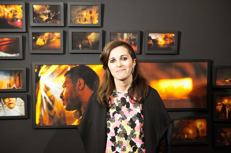 Laura El Tantawy in front of her exhibition, In The Shadow of the Pyramids at Gulf Photo Plus gallery. Courtesy of GPP