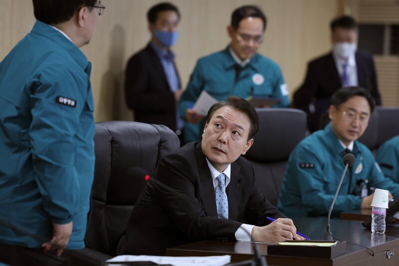 South Korea's President Yoon Suk-yeol, centre, attends a meeting of the National Security Council in Seoul, South Korea, on Wednesday. AP