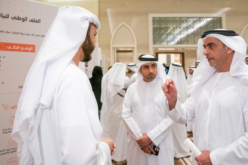 ABU DHABI, UNITED ARAB EMIRATES - November 10, 2019: HH Lt General Sheikh Saif bin Zayed Al Nahyan, UAE Deputy Prime Minister and Minister of Interior (R), speaks with a National Experts Program graduate during a Capstone project presentation, in the Vice President's wing at Qasr Al Watan. 

( Hamad Al Kaabi / Ministry of Presidential Affairs )​
---