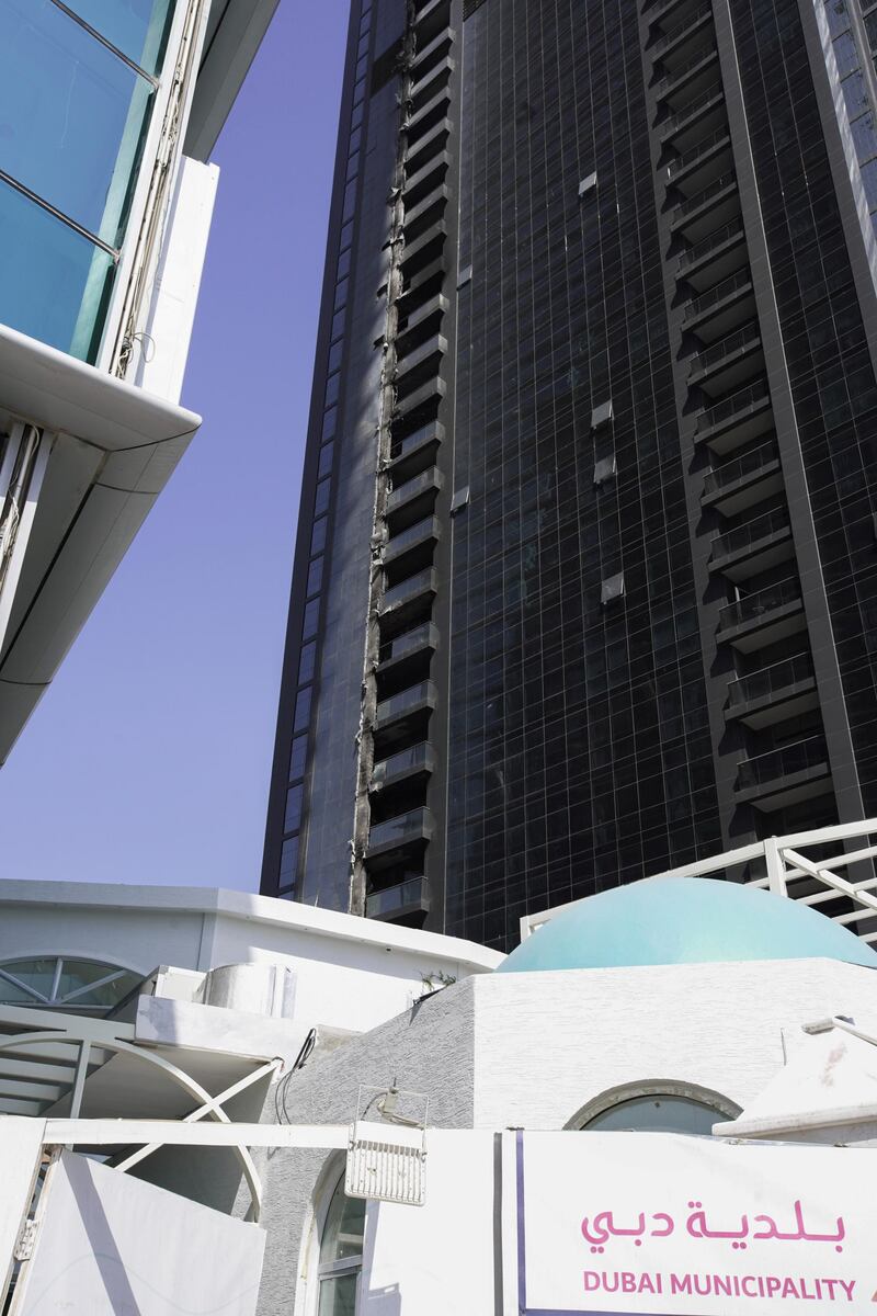 Dubai, United Arab Emirates, February 21, 2020.  
Fire at Duja Tower.  Residents gather their belongings from their units at the tower.
Victor Besa / The National
Section:  NA
Reporter:  None
Victor Besa / The National