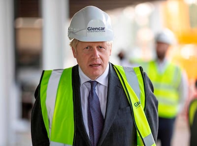 Britain's Prime Minister Boris Johnson visits the construction site of the new dedicated Vaccines Manufacturing Innovation Centre (VMIC) currently under construction on the Harwell science and innovations campus near Didcot in central England on September 18, 2020.  The building is being constructed to manufacture vaccines for Covid-19 and is set to open next summer. / AFP / POOL / RICHARD POHLE
