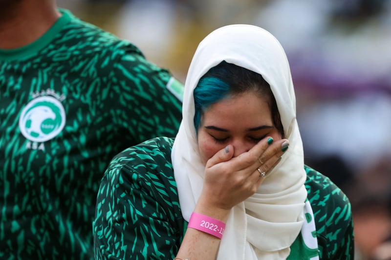 A Saudi fan shows her disappointment. AFP