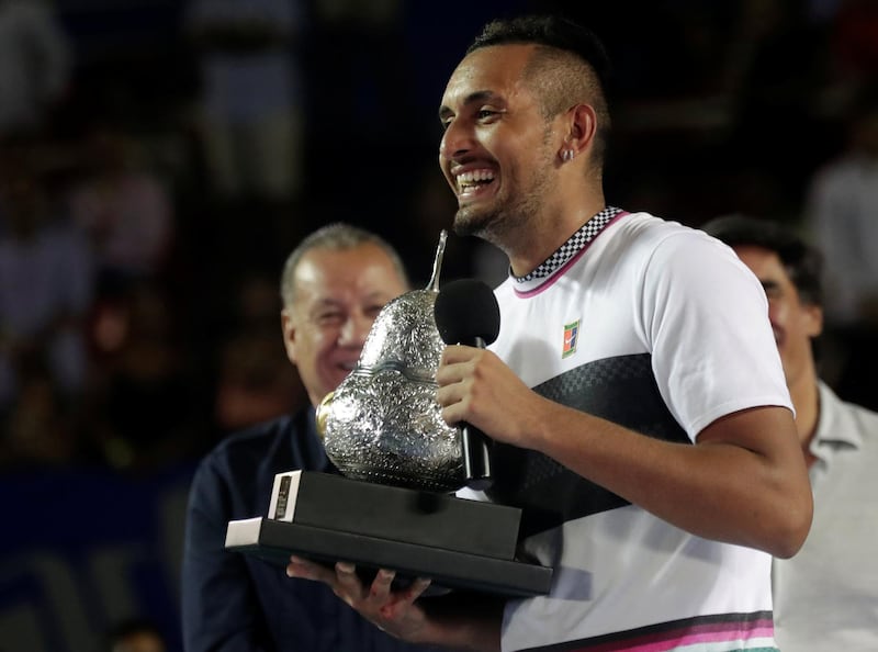 Tennis - ATP 500 - Acapulco Open, Acapulco, Mexico - March 2, 2019    Australia’s Nick Kyrgios celebrates winning the Acapulco Open with the trophy   REUTERS/Henry Romero