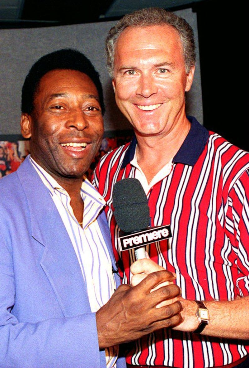 The two greats, Brazil's Pele, left, and Franz Beckenbauer of Germany meet again in Chicago on June 18, 1994. AFP