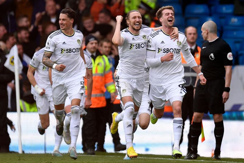 Leeds United's Patrick Bamford celebrates with teammates after scoring the opening goal. AFP