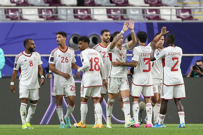 United Arab Emirates players celebrate after Adil's goal. AP