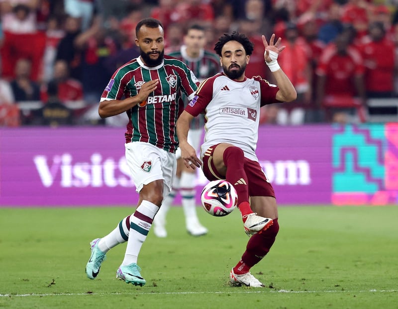 Al Ahly's Marwan Attia in action with Fluminense's Samuel Xavier. Reuters