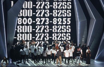 Khalid, from left, Logic, and Alessia Cara perform "1-800-273-8255" at the MTV Video Music Awards at The Forum on Sunday, Aug. 27, 2017, in Inglewood, Calif. (Photo by Matt Sayles/Invision/AP)