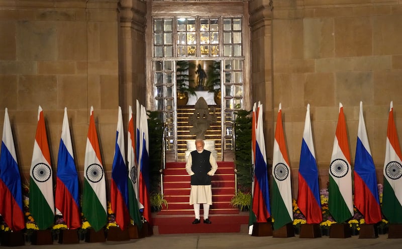 Mr Modi waits to receive the visiting Russian president in New Delhi. AP Photo
