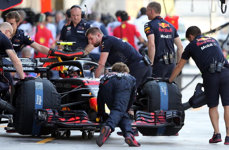 Red Bull driver Max Verstappen gets pushed back into his garage. AP Photo