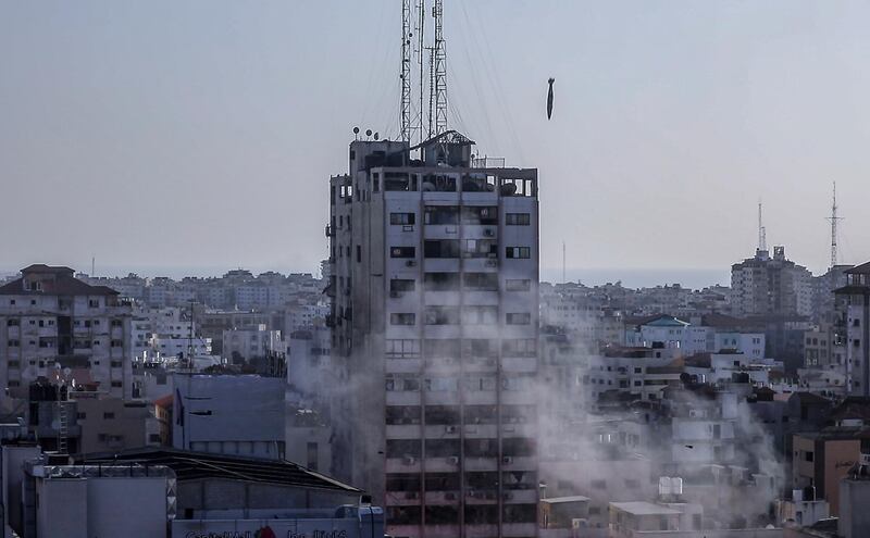 An Israeli missile seen during an air strike at Al-Shorouk tower. EPA
