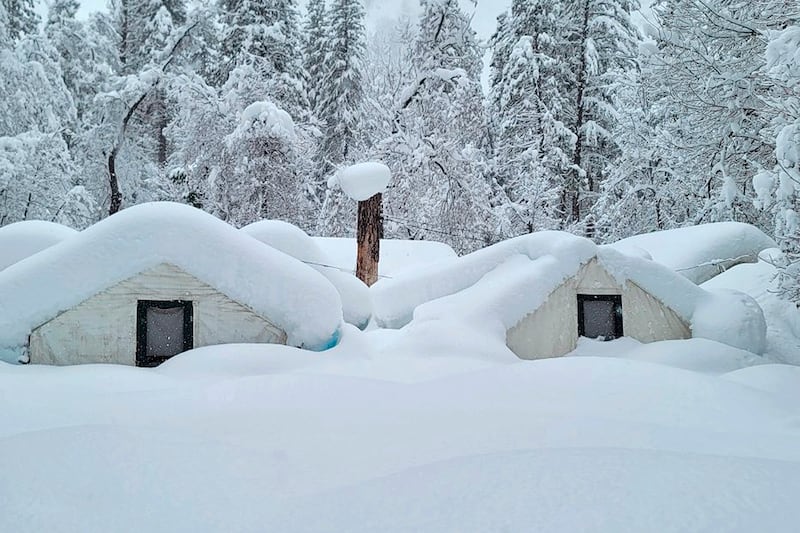 Tents at Curry Village in Yosemite National Park seen covered with snow. AP