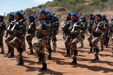 In this Monday Oct. 7, 2019 photo, Turkish-backed forces from the Free Syrian Army, parade during military training in preparation for an anticipated Turkish incursion targeting Syrian Kurdish fighters, near Azaz, in north Syria. Turkey's vice president said Tuesday his country won't bow to threats in an apparent response to U.S. President Donald Trump who warned Ankara about the scope of its planned military incursion into northeast Syria. (AP Photo)