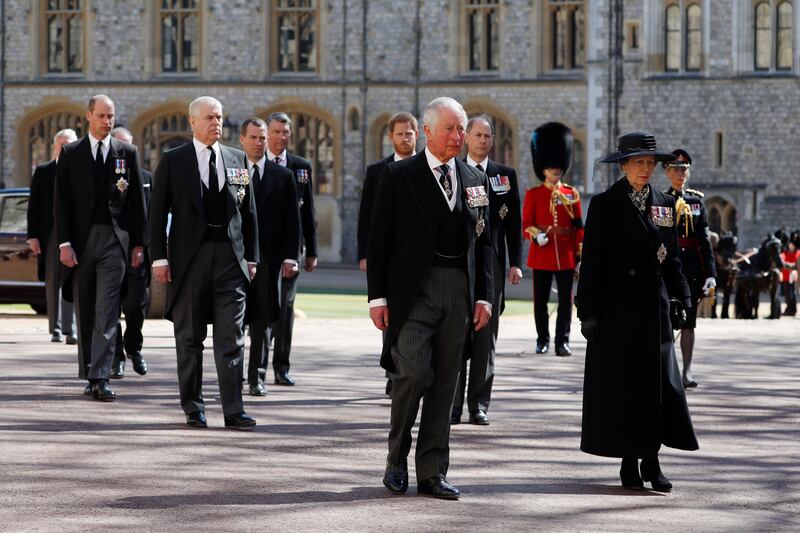 Princess Anne and Prince Charles follow Prince Philip's coffin during the Ceremonial Procession at Windsor Castle in 2021. 