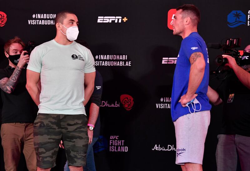 ABU DHABI, UNITED ARAB EMIRATES - JULY 24: In this handout image provided by UFC,  (L-R) Opponents Robert Whittaker of New Zealand and Darren Till of England face off during the UFC Fight Night weigh-in inside Flash Forum on UFC Fight Island on July 24, 2020 in Yas Island, Abu Dhabi, United Arab Emirates. (Photo by Jeff Bottari/Zuffa LLC via Getty Images)