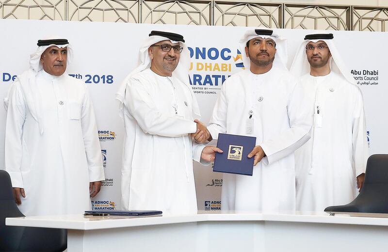 ABU DHABI , UNITED ARAB EMIRATES , JULY 3 – 2018 :-  Left to Right -  Major General Mohammed Khalfan Al Romaithi , Chairman of General Authority for Sports , Aref Hamad Al Awani , General Secretary of Abu Dhabi Sports Council , Omar Suwaina Al Suwaidi , Executive Office Director at ADNOC  and Sultan Ahmed Al Jaber , Minister of State , UAE , Director General & CEO of ADNOC during the signing ceremony and press conference of First ADNOC Abu Dhabi Marathon held at ADNOC headquarters in Abu Dhabi. The long distance race will be held for the first time on December 7, 2018.  ( Pawan Singh / The National )  For Sports. Story by Amit 