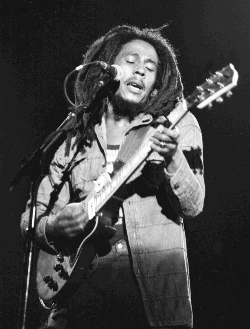 FILE - In this July 4, 1980 file photo, Jamaican Reggae singer Bob Marley performs in front of an audience of 40,000 during a concert in Paris. Marley, along with Diana Ross, Chuck Berry, the Beach Boys and Journey, are part of a group of iconic musicians who have never won a Grammy. Marley was the recipient of the Lifetime Achievement Award, a noncompetitive honor, from The Recoding Academy. (AP File Photo)