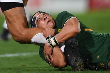 South Africa's Cheslin Kolbe tackles Japan's Ataata Moeakiola during the friendly rugby match between Japan and South Africa at the Kumagaya Rugby Stadium in Kumagaya on September 6, 2019. / AFP / CHARLY TRIBALLEAU