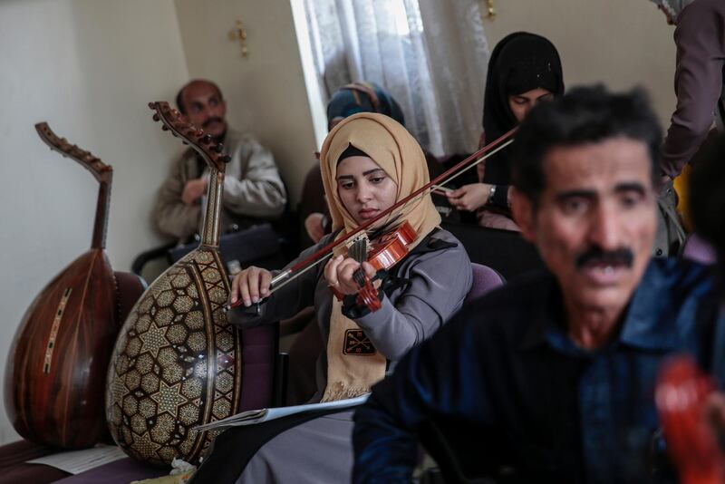 A female Yemeni music student plays the violin during a music class at the Cultural Centre in Sanaa, Yemen.Hani Mohammed / AP Photo