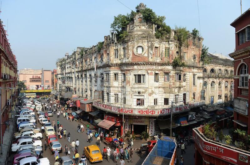 Many of the glorious buildings in downtown Kolkata are derelict, with vegetation growing out of their walls. Gareth Copley / Getty Images