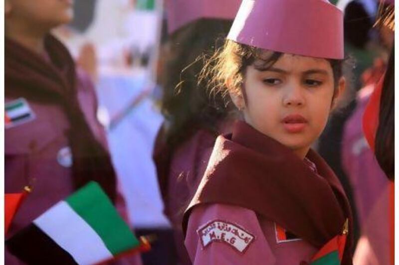 UAE scouts marching on Al Mamzar Corniche in Dubai yesterday to celebrate the 39th National Day.