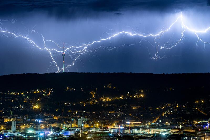 Lightning is seen over the city of Stuttgart, southern Germany,  as the heat wave in large parts of Europe gives way to storms and heavy rain. AP
