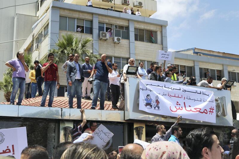 Jordanians gather at the professional Associations compound to participate at the country's strike refusing the new incom law draft put by the government and sent to the parliament, in Amman, Jordan, on May 30, 2018. (Salah Malkawi for The National)