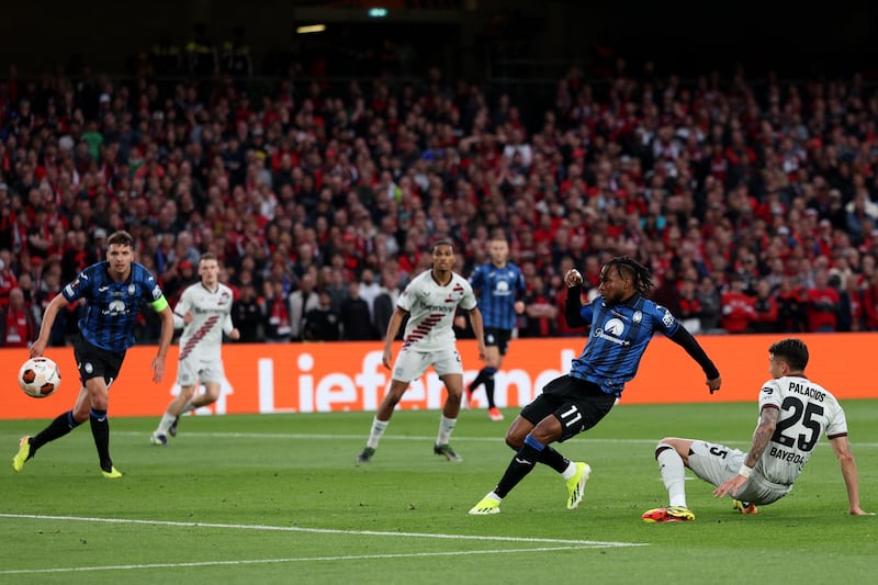 Ademola Lookman shoots to score Atalanta's first goal in the Europa League final. AFP