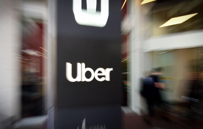 (FILES) In this file pan zoom photo taken on May 08, 2019 an Uber logo is seen outside the company's headquarters in San Francisco, California.  Uber on April 28, 2021 added valet delivery of rental cars as part of a suite of offerings as it aims to be "one-stop-shop" for post-pandemic venturing out or dining in. As Covid-19 vaccines make it safer for people to move about, Uber aims to be a hub for summoning rides; running errands, or renting vehicles.
 / AFP / Josh Edelson
