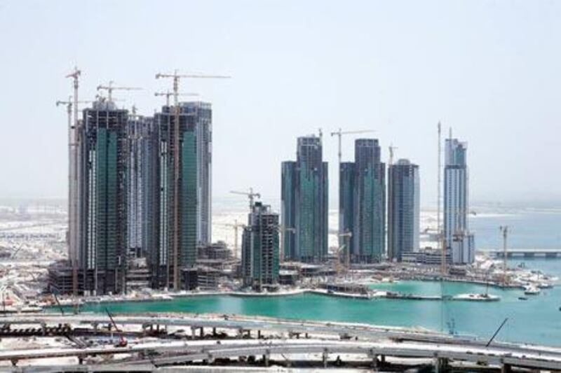 Work on Reem Island is to slow in response to the property downturn.