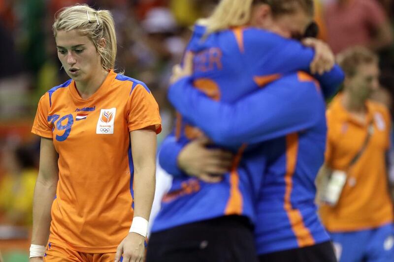Netherlands’ Estavana Polman, left, leaves the field after losing the women’s bronze medal handball match between the Netherlands and Norway at the 2016 Summer Olympics in Rio de Janeiro, Brazil, Saturday, August 20, 2016. Matthias Schrader / AP Photo