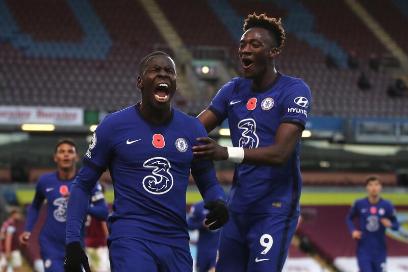 Chelsea's Kurt Zouma, left, celebrates scoring his side's second goal  in their 3-0 win at Burnley on Saturday, October 31. AP