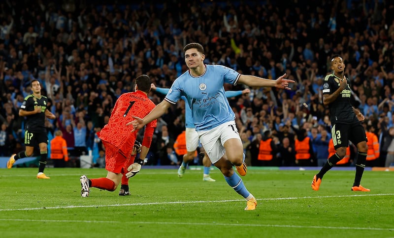Manchester City's Julian Alvarez celebrates scoring their fourth goal. Reuters
