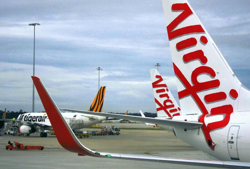 FILE PHOTO: A Tigerair Australia plane sits on the tarmac near Virgin Australia aircraft at Melbourne's Tullamarine International Airport, Australia, October 12, 2016.    REUTERS/David Gray/File Photo                      GLOBAL BUSINESS WEEK AHEAD        SEARCH GLOBAL BUSINESS 26 FEB FOR ALL IMAGES