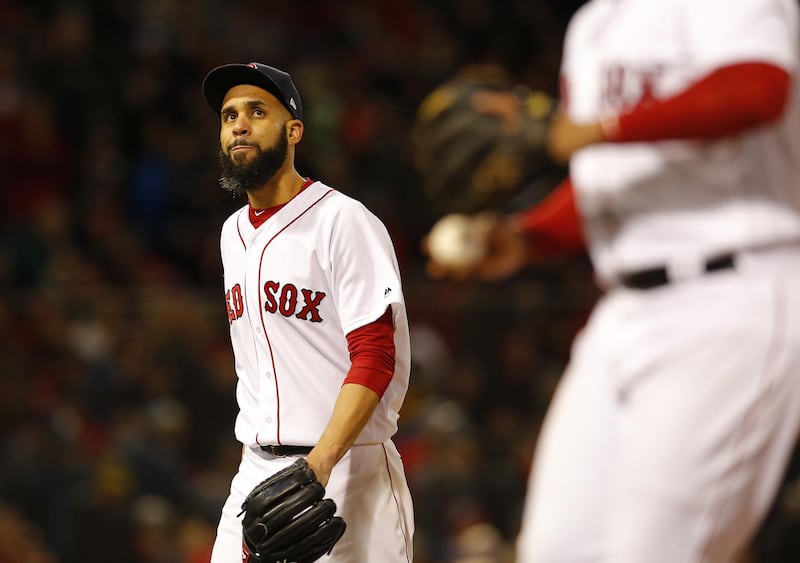 epa07117926 Boston Red Sox pitcher David Price walks off after the end of the top of the fifth inning of game two of the World Series at Fenway Park in Boston, Massachusetts, USA, 24 October 2018. The Red Sox lead the best-of-seven series 1-0 to determine the champion of Major League Baseball.  EPA/CJ GUNTHER