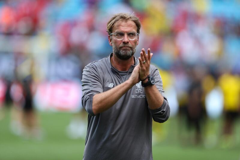 Liverpool Coach Jurgen Klopp applauds the fans after the final whistle. Reuters