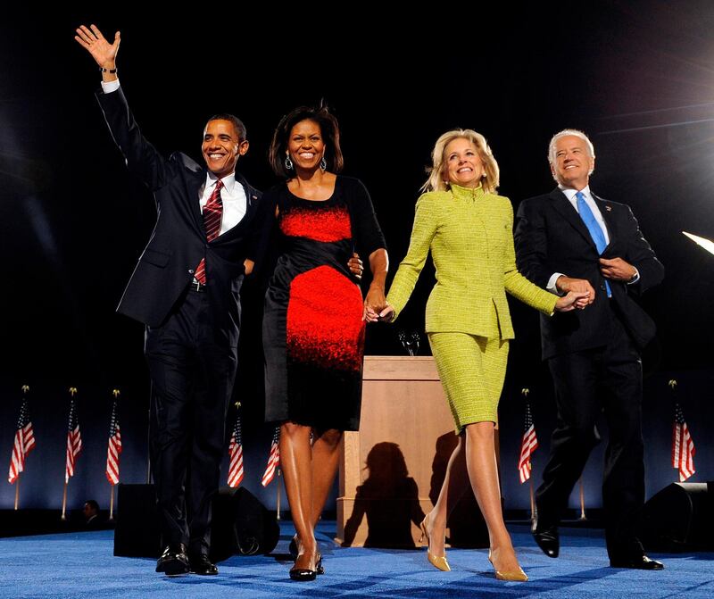 (FILES) In this file photo taken on November 04, 2008, US President-elect Barack Obama (L), his wife Michelle (2ndL), vice president-elect Joe Biden (R) and his wife Jill arrive for an election night party in Chicago, Illinois. Jill Biden is no stranger to the glare of the political spotlight. Her husband has been a Washington insider since they wed in 1977, and she was America's second lady for eight years. But if Joe Biden wins the White House, his 69-year-old wife will have the opportunity to push the role of first lady into the 21st century -- by keeping her full-time job as a professor. "Most American women have both a work life and a family life, but first ladies have never been allowed to do so," said Katherine Jellison, a history professor at Ohio University. / AFP / Emmanuel DUNAND
