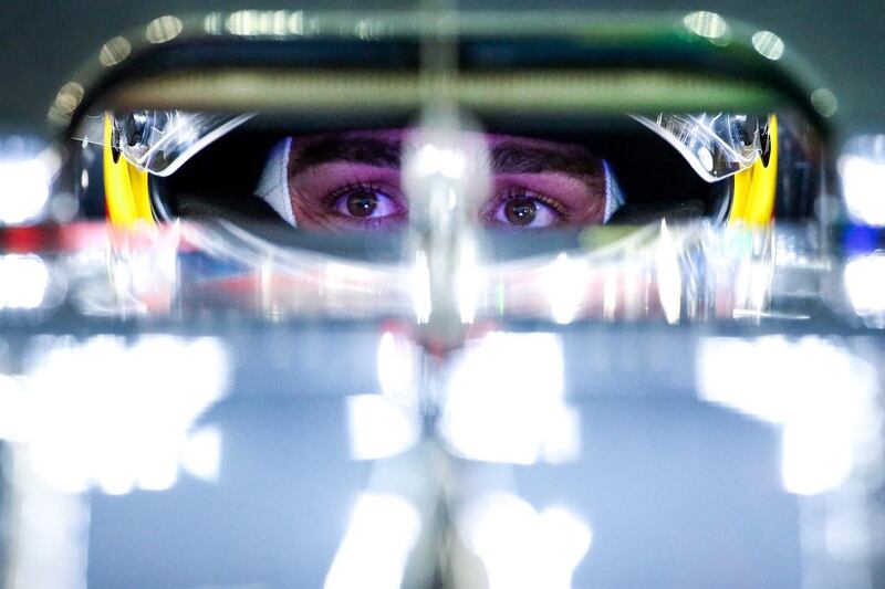 Spanish Formula One driver Fernando Alonso of McLaren-Honda sits in his car during the second practice session for the Singapore Formula One Grand Prix night race in Singapore. EPA