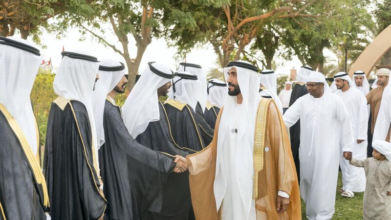 ABU DHABI, UNITED ARAB EMIRATES - November 27, 2018: HH Sheikh Nahyan Bin Zayed Al Nahyan, Chairman of the Board of Trustees of Zayed bin Sultan Al Nahyan Charitable and Humanitarian Foundation (R), greets a groom during a mass wedding reception of HH Sheikh Mohamed bin Khalifa bin Khaled Al Nahyan (not shown), at The Emirates Palace.

( Rashed Al Mansoori / Ministry of Presidential Affairs )
---