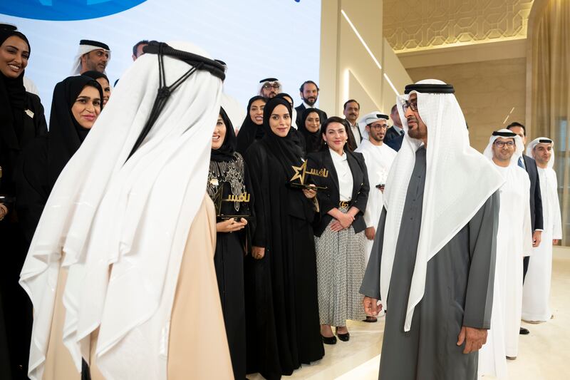 President Sheikh Mohamed and Sheikh Mohammed bin Rashid speak with award winners.