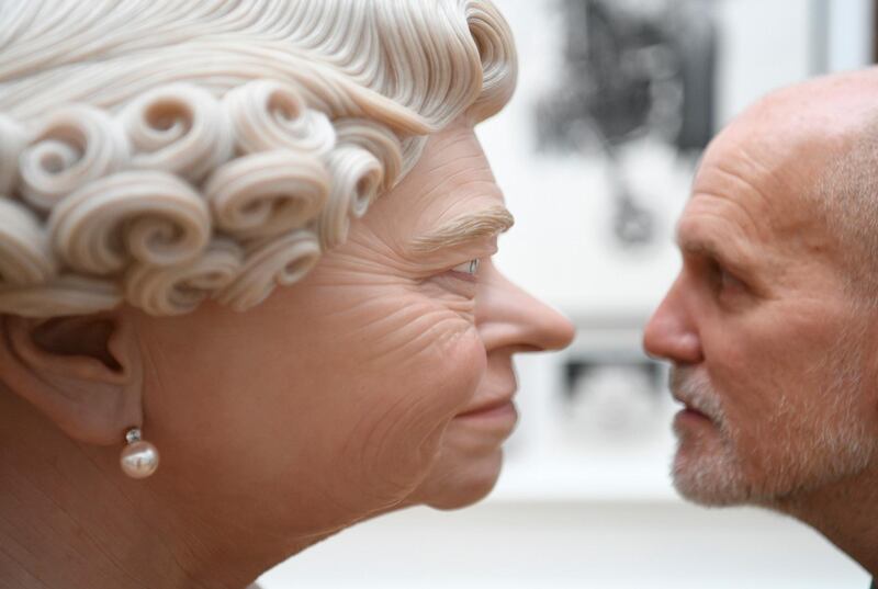 epa06786180 A man looks at the work 'The Queen' by artist John Humphries is displayed during the media preview of Summer Exhibition at the Royal Academy of Arts in London, Britain 05 June 2018. The Royal Academy of Arts Summer Exhibition is in its 250th year. The open exhibition displays over one thousand works and was co-ordinated by British Artist Grayson Perry.  EPA/NEIL HALL