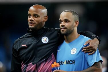 Soccer Football - Vincent Kompany's Testimonial - Manchester City Legends v Premier League All-Stars - Etihad Stadium, Manchester, Britain - September 11, 2019 Vincent Kompany with brother, Francois Kompany Action Images via Reuters/Carl Recine