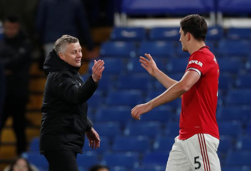 Ole Gunnar Solskjaer celebrates with Harry Maguire after the match. Reuters