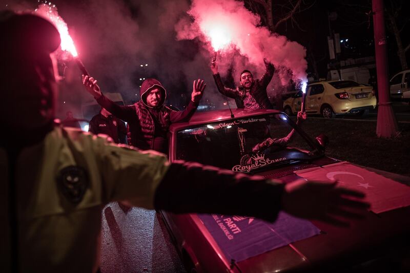 Supporters of the AKP celebrate early results in Istanbul. EPA