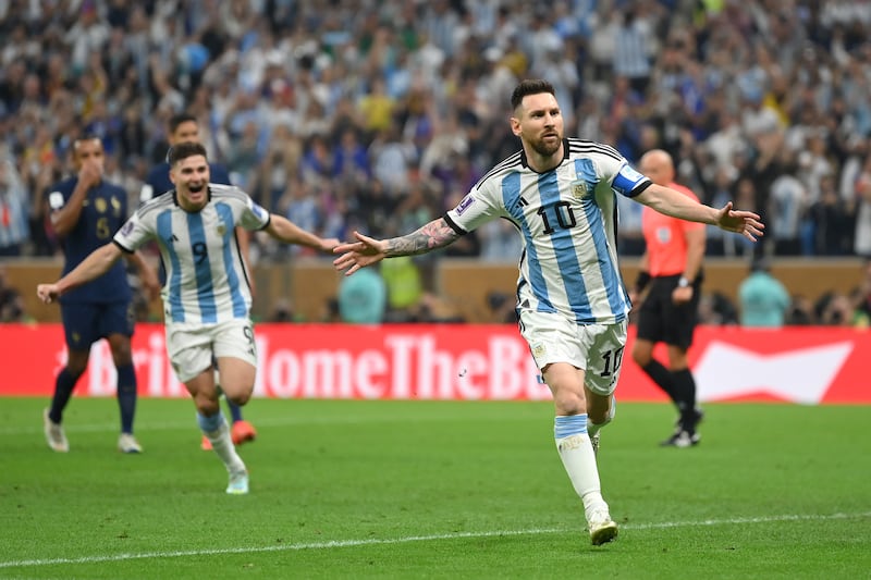 Lionel Messi celebrates after scoring a first-half penalty for Argentina. Getty