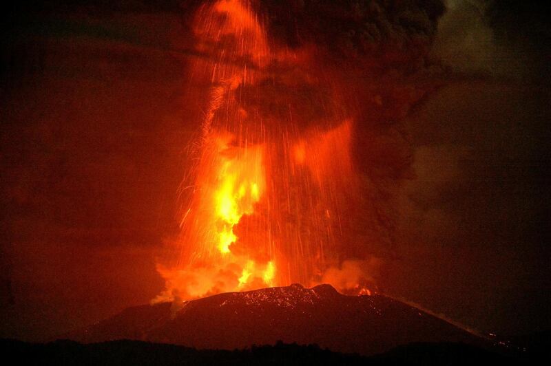 The Shinmoedake volcano spews molten lava in Kagoshima, Japan. Kyodo via Reuters