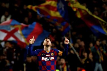 Leo Messi celebrates after scoring his hat-trick against Mallorca. EPA