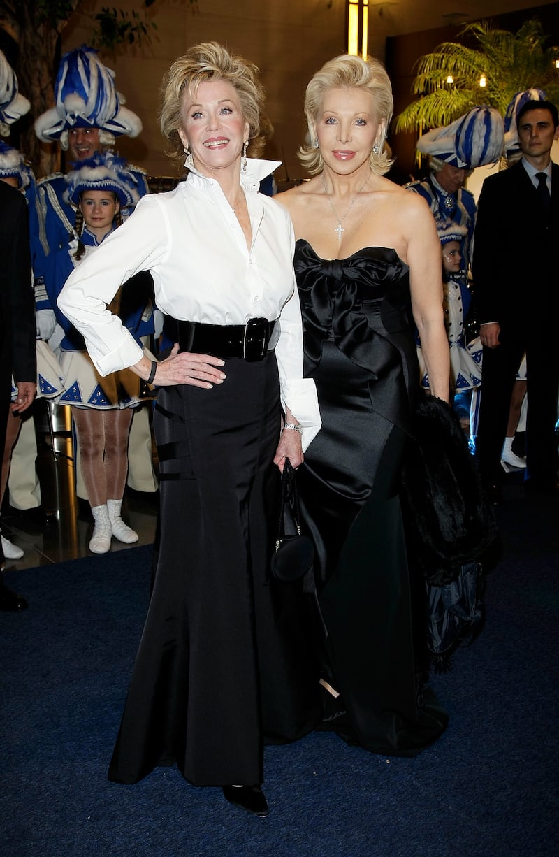 Jane Fonda, in a white collared top and black skirt, at the Unesco Charity Gala 2009, at the Maritim Hotel in Dusseldorf, Germany, with host Ute Ohoven, on November 14, 2009
