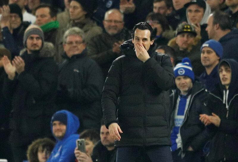 Soccer Football - Premier League - Brighton & Hove Albion v Arsenal - The American Express Community Stadium, Brighton, Britain - December 26, 2018  Arsenal manager Unai Emery reacts  REUTERS/Peter Nicholls  EDITORIAL USE ONLY. No use with unauthorized audio, video, data, fixture lists, club/league logos or "live" services. Online in-match use limited to 75 images, no video emulation. No use in betting, games or single club/league/player publications.  Please contact your account representative for further details.