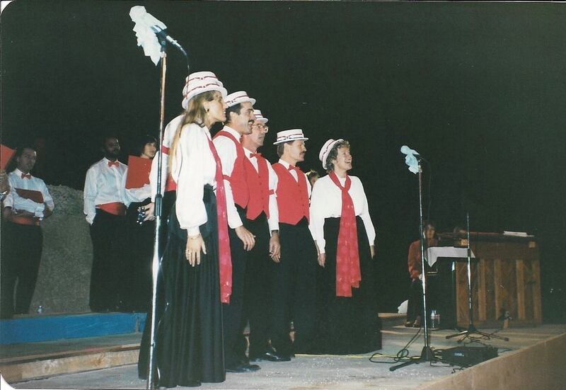The Abu Dhabi Choral Group and Barbershop Quintet entertaining US airforce troops at Al Dhafra airbase, Christmas 1990. Courtesy: Christine Rendel